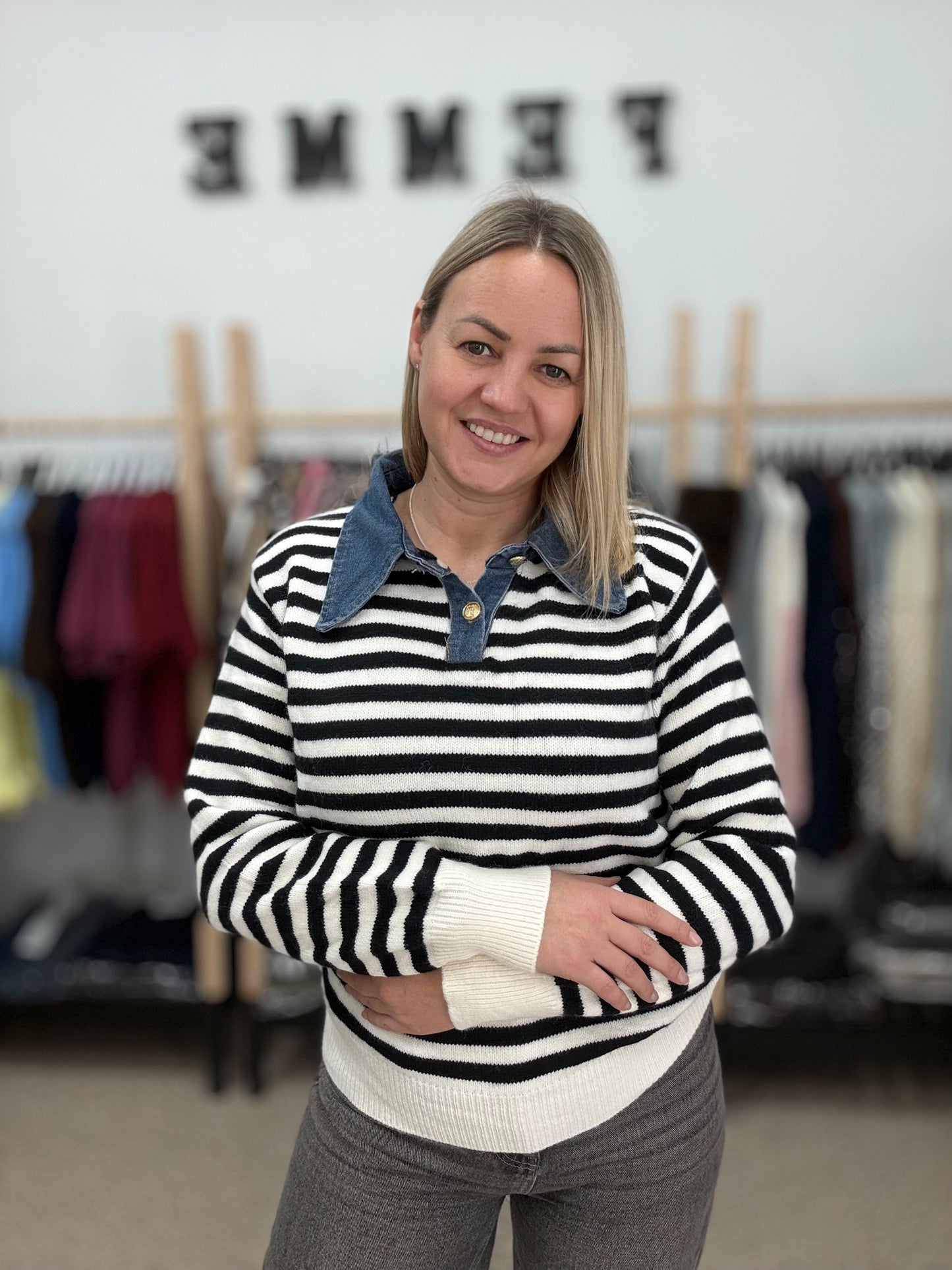 Striped sweater with a denim hem