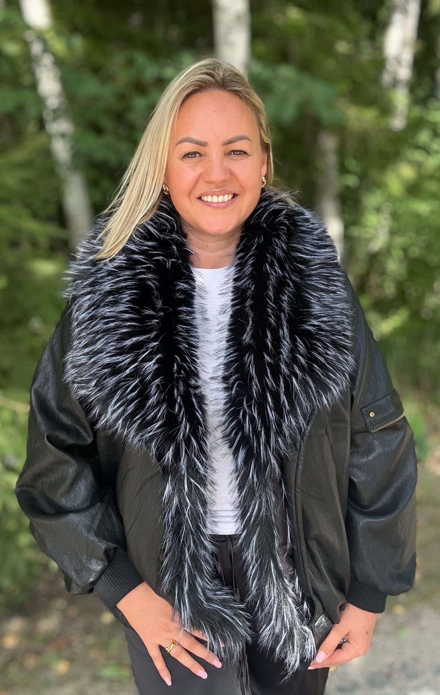 Faux leather jacket with faux fur black color